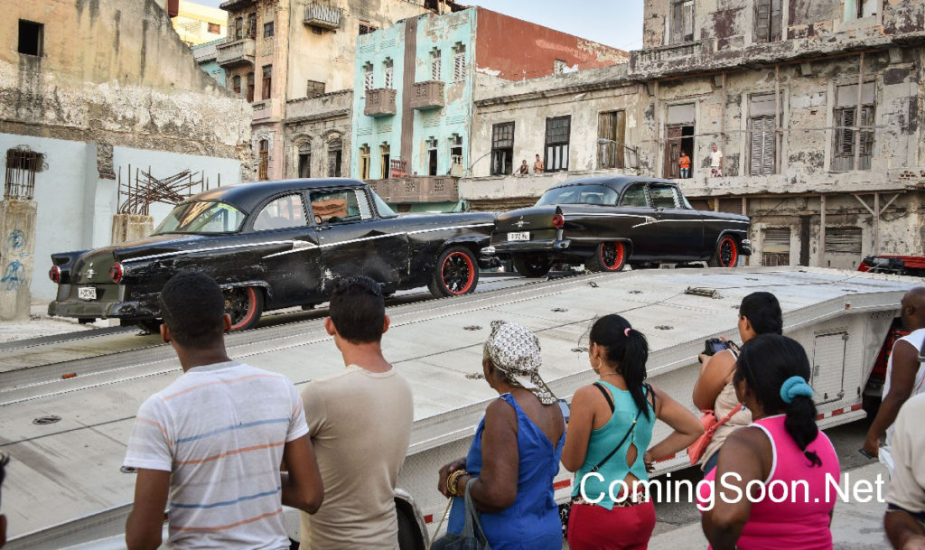 Cubans look at cars used during the shooting of Fast & Furious 8 in Havana, on April 28, 2016.  / AFP / ADALBERTO ROQUE        (Photo credit should read ADALBERTO ROQUE/AFP/Getty Images)